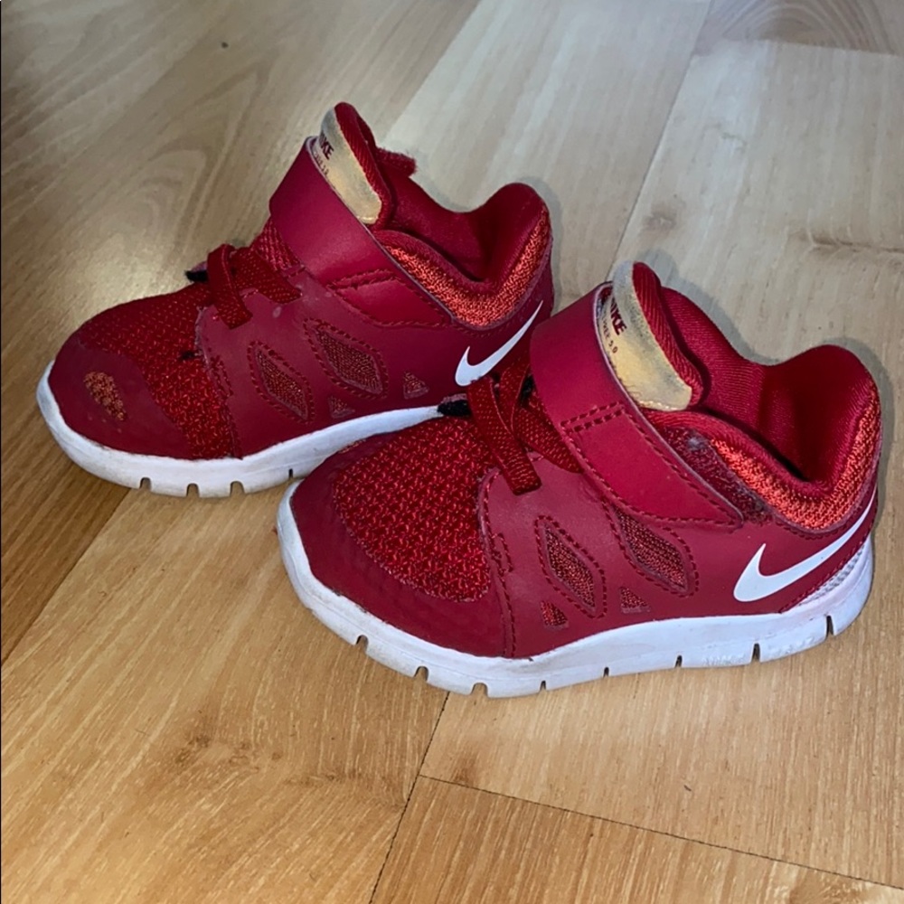 Baby size 4 red Nike tennis shoes